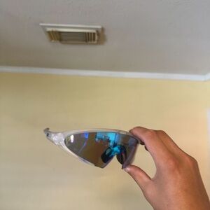 Sporty Clear Frame Sunglasses with Blue Mirrored Lens Oakley Oakleys